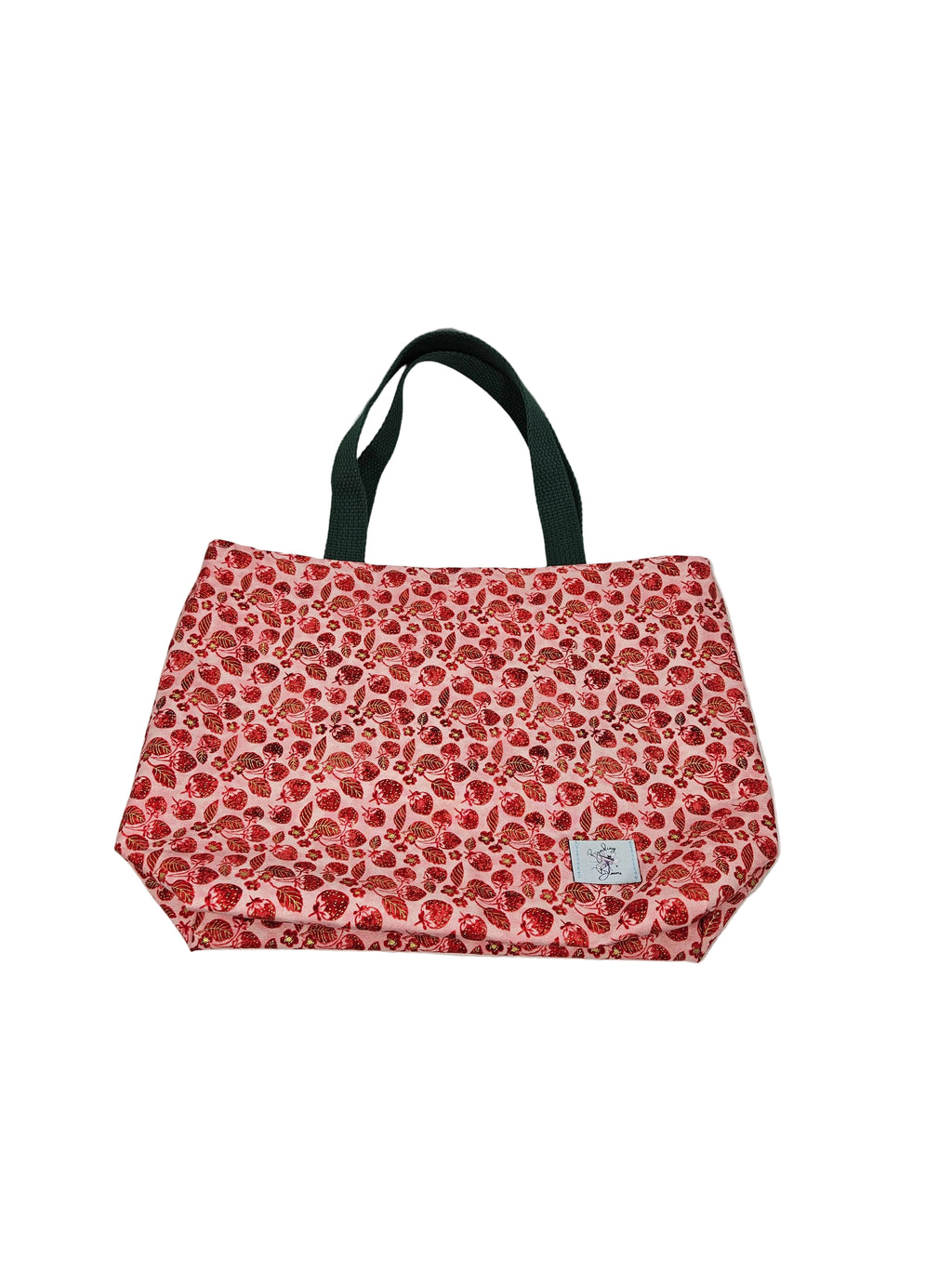 Red strawberry patterned bag with a green handle